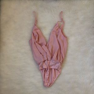 Pink bodysuit